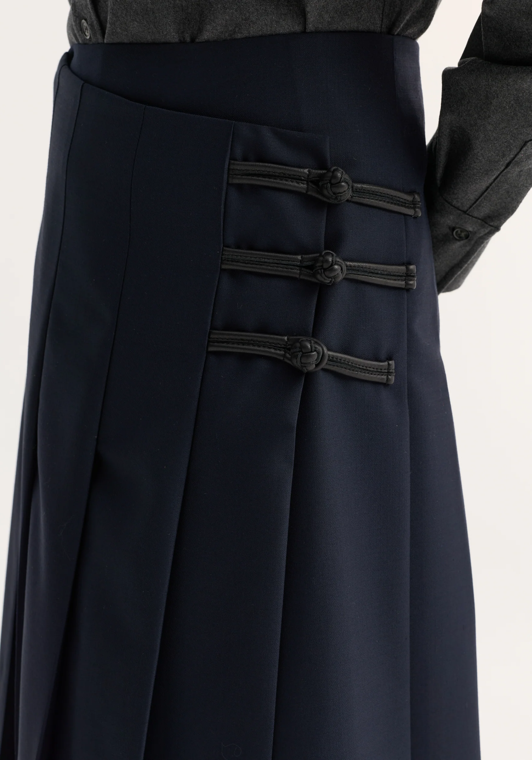 Pleated wool skirt with leather closures | navy - Image 5